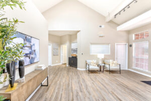 Interior Lobby, Contemporary decor, wood floors, tree in box planter, contemporary art on the walls, neutral toned walls.